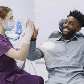Happy patient after root canal therapy
